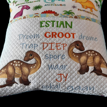 Two dinos reading pillow with pocket 
